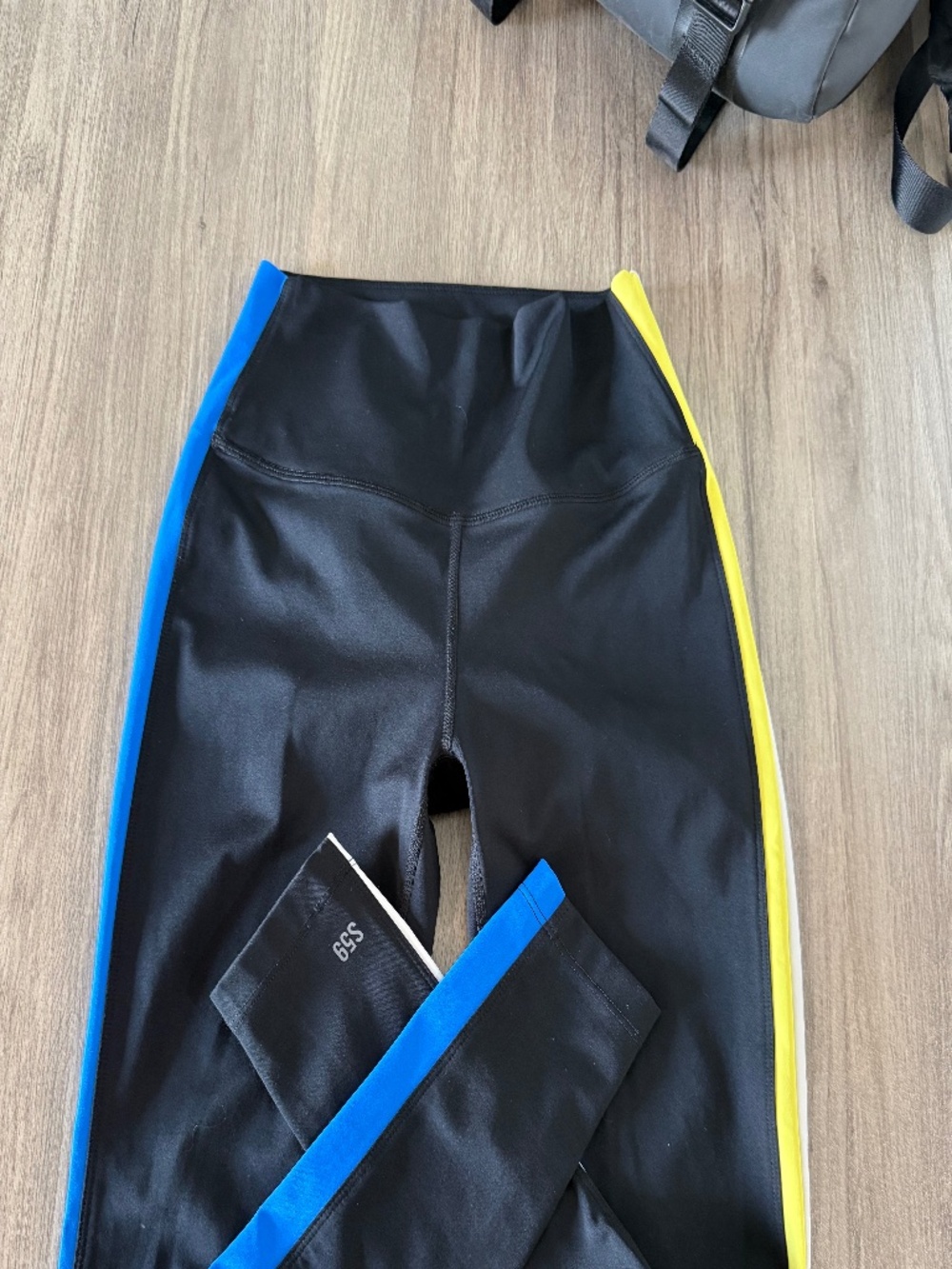 Splits59 Black Leggings with Blue and Yellow Stripes